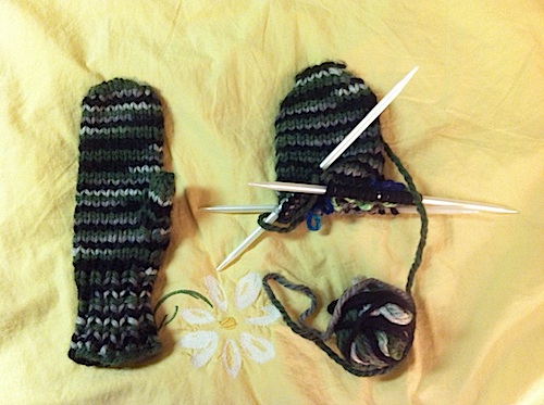 The too-small mitten is on the left... see how the one on the right will be wider when it's done?